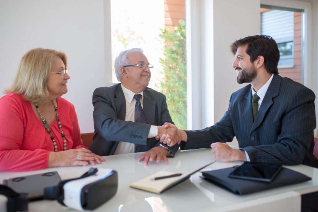 insurance agent meeting with clients